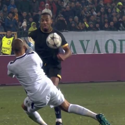 Black with Gold Trim: Lifts the ball as the first challenge comes in.